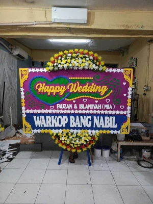 Papan Bunga di Wisma 46