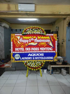 Papan Bunga di Wisma 46