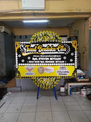 Papan Bunga di Wisma 46