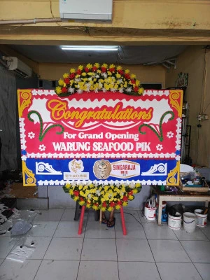 Papan Bunga di Wisma 46