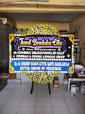 Papan Bunga di Wisma 46